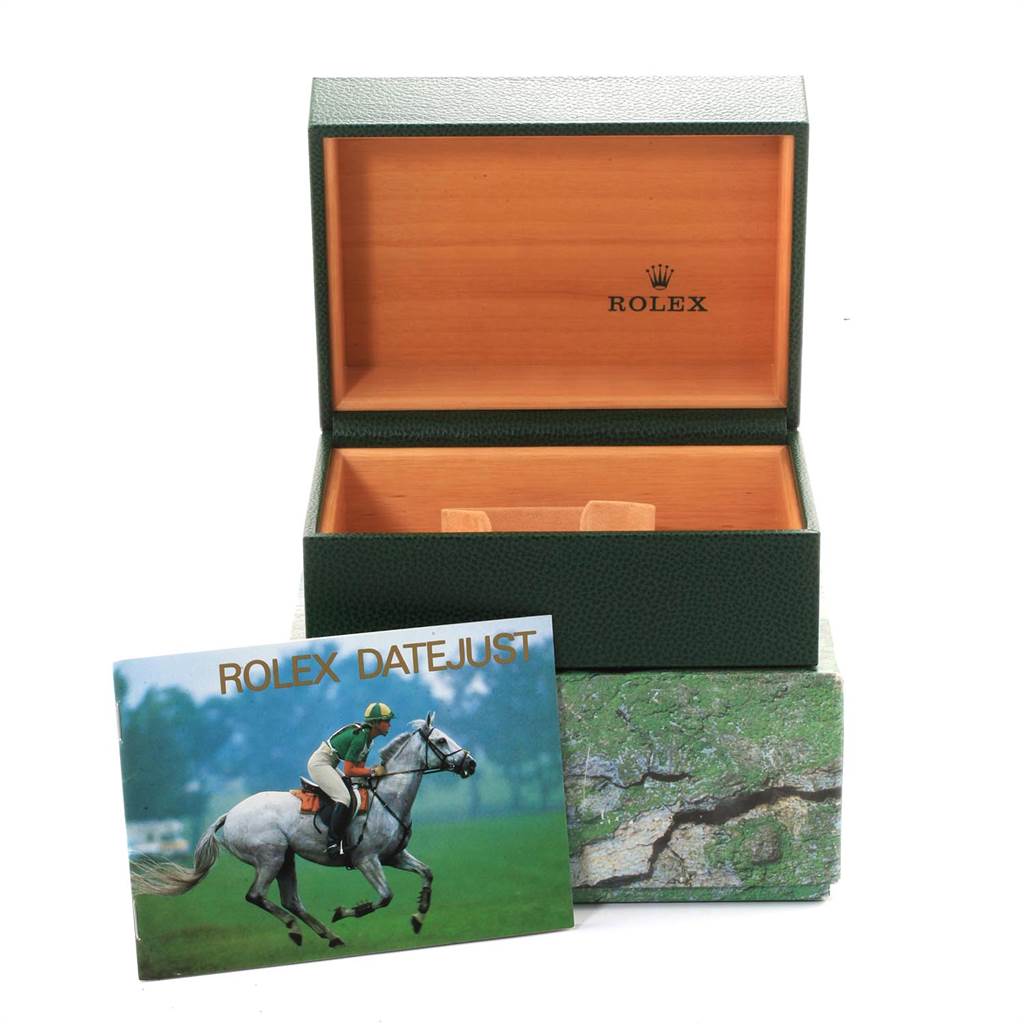 The image shows an open Rolex Datejust 16233 Men's Steel and Gold (two tone) Champagne Dial 16233 Men's Steel and Gold (two tone) Champagne Dial watch box and a Rolex Datejust 16233 Men's Steel and Gold (two tone) Champagne Dial 16233 Men's Steel and Gold (two tone) Champagne Dial manual with a horse and rider on the cover.