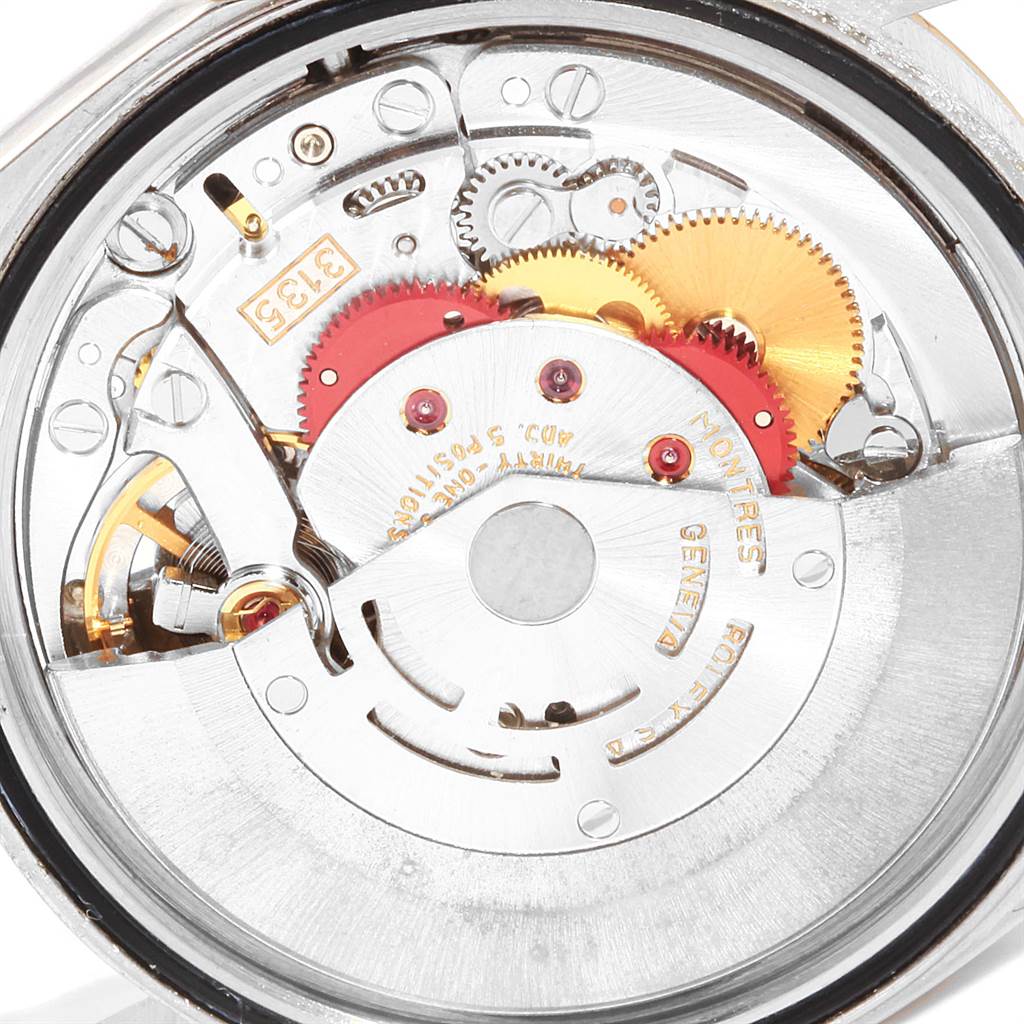 This image shows the internal movement mechanism of a Rolex Datejust 16233 Men's Steel and Gold (two tone) Champagne Dial 16233 Men's Steel and Gold (two tone) Champagne Dial watch at a close-up angle.