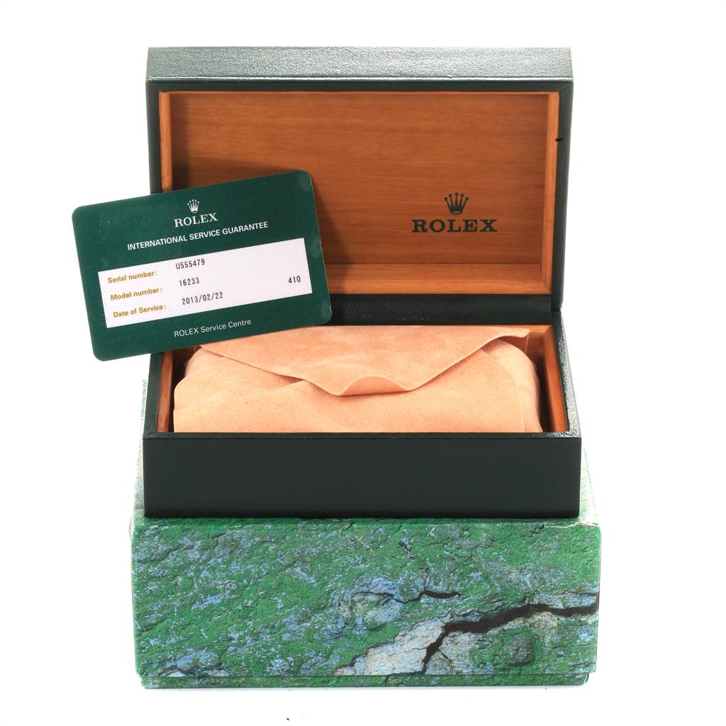 The image shows a Rolex Datejust 16233 Men's Steel and Gold (two tone) Champagne Dial 16233 Men's Steel and Gold (two tone) Champagne Dial watch box, partially opened, with an international service guarantee card.