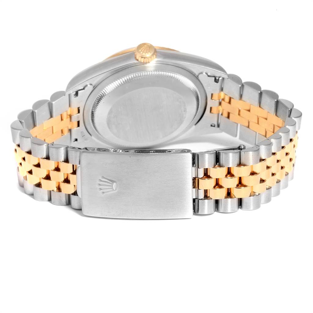 The image shows the back view of a Rolex Datejust 16233 Men's Steel and Gold (two tone) Champagne Dial 16233 Men's Steel and Gold (two tone) Champagne Dial watch, highlighting the case back and the two-tone bracelet.