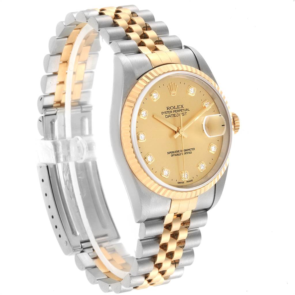The Rolex Datejust 16233 Men's Steel and Gold (two tone) Champagne Dial 16233 Men's Steel and Gold (two tone) Champagne Dial watch is shown at a three-quarter angle, highlighting its two-tone bracelet, gold dial, and fluted bezel.