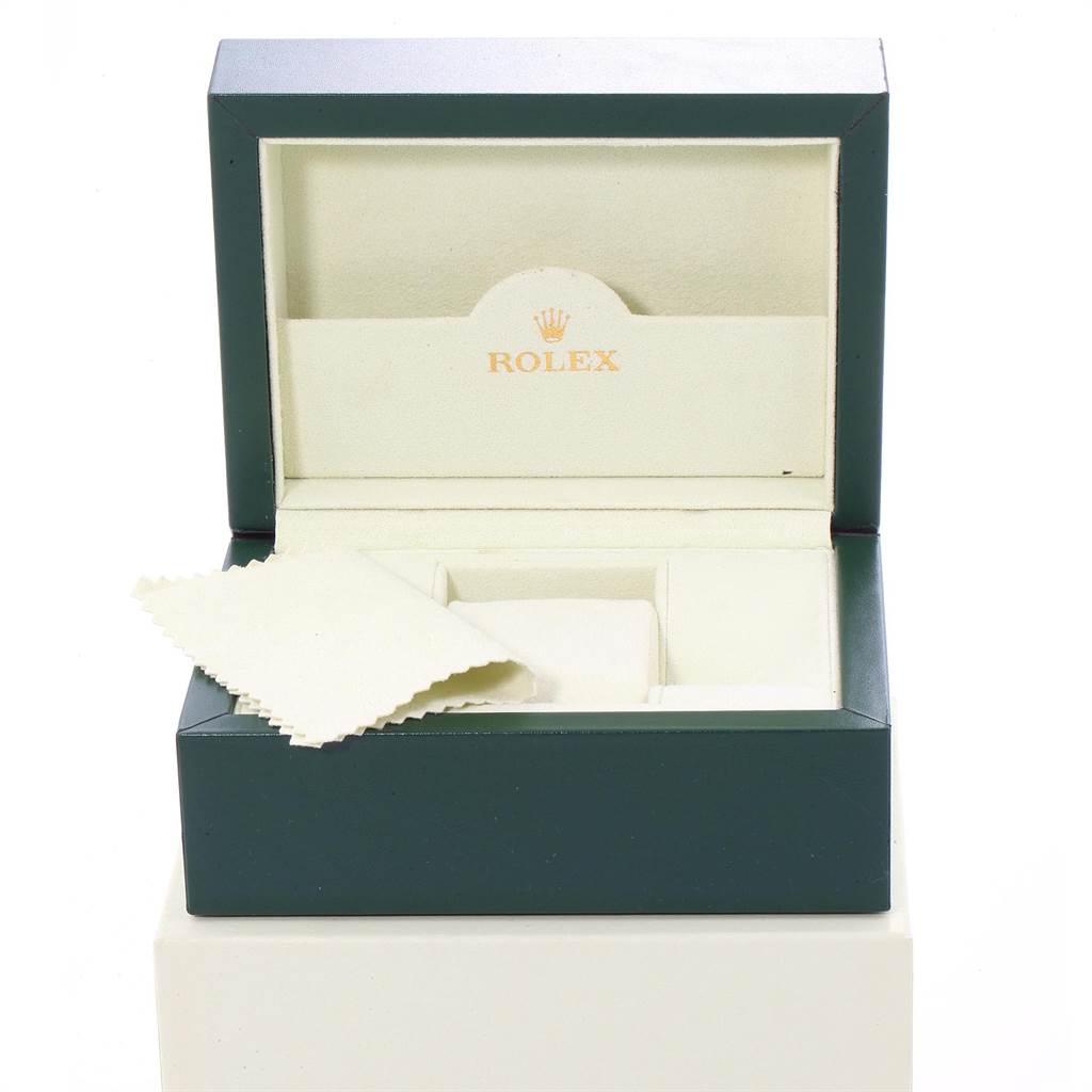 This image shows an open Rolex Datejust 116233 Men's Stainless Steel Beige Dial 116233 Men's Stainless Steel Beige Dial watch box with a cloth inside, viewed from the front.