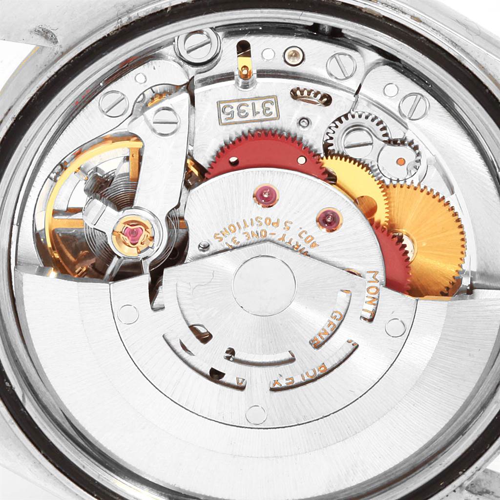 This image shows the internal mechanism and gears of a Rolex Datejust 16233 Men
s Steel and Gold (two tone) Black Dial 16233 Men
s Steel and Gold (two tone) Black Dial watch from a top-down angle.