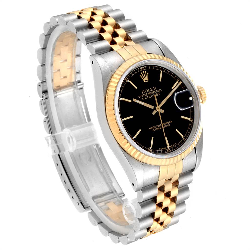 This image shows a Rolex Datejust 16233 Men
s Steel and Gold (two tone) Black Dial 16233 Men
s Steel and Gold (two tone) Black Dial watch from an angled side view, displaying its two-tone bracelet, black dial, and fluted bezel.