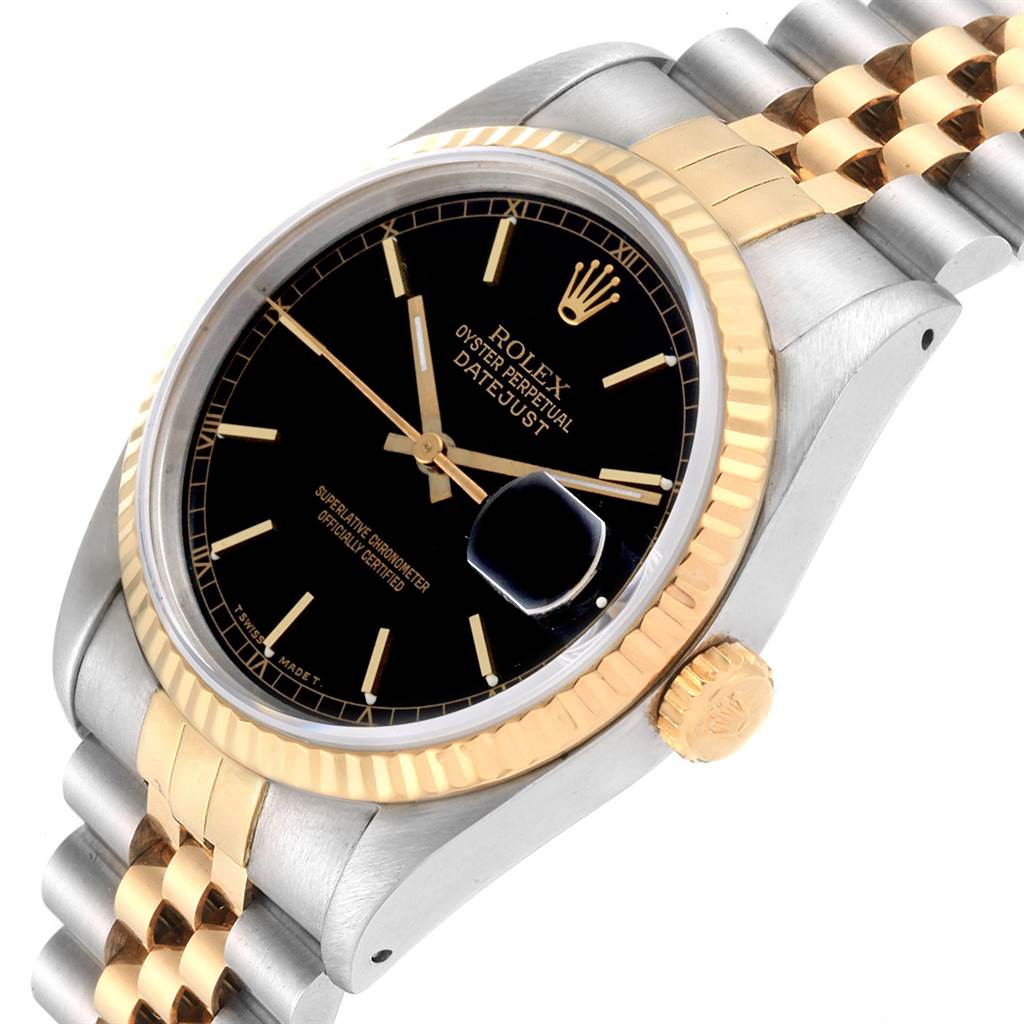 This image shows a Rolex Datejust 16233 Men
s Steel and Gold (two tone) Black Dial 16233 Men
s Steel and Gold (two tone) Black Dial from an angled top view, highlighting its black dial, gold bezel, and two-tone bracelet.