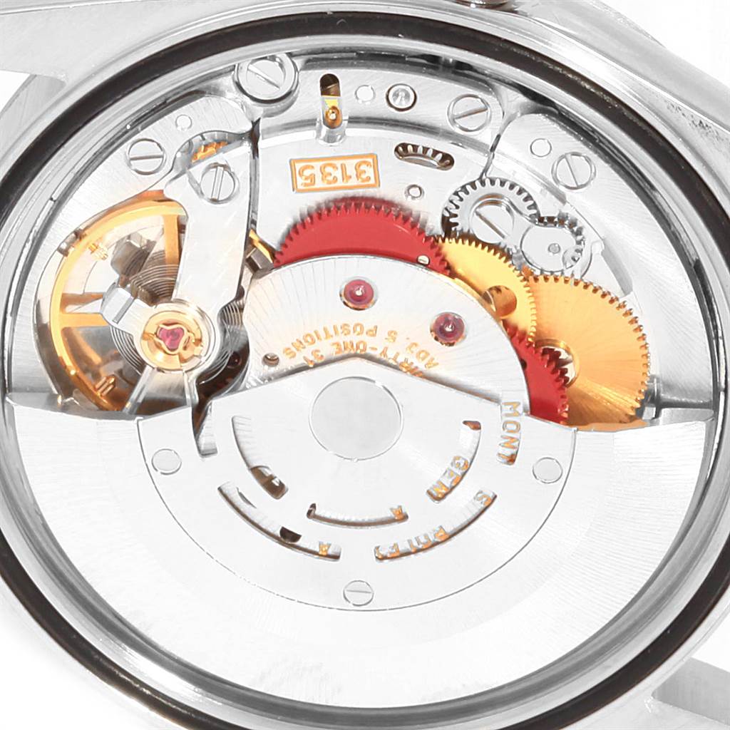 This image shows the exposed movement and inner workings of a Rolex Datejust 16234 Men's Stainless Steel Blue Dial 16234 Men's Stainless Steel Blue Dial watch, viewed from the back.