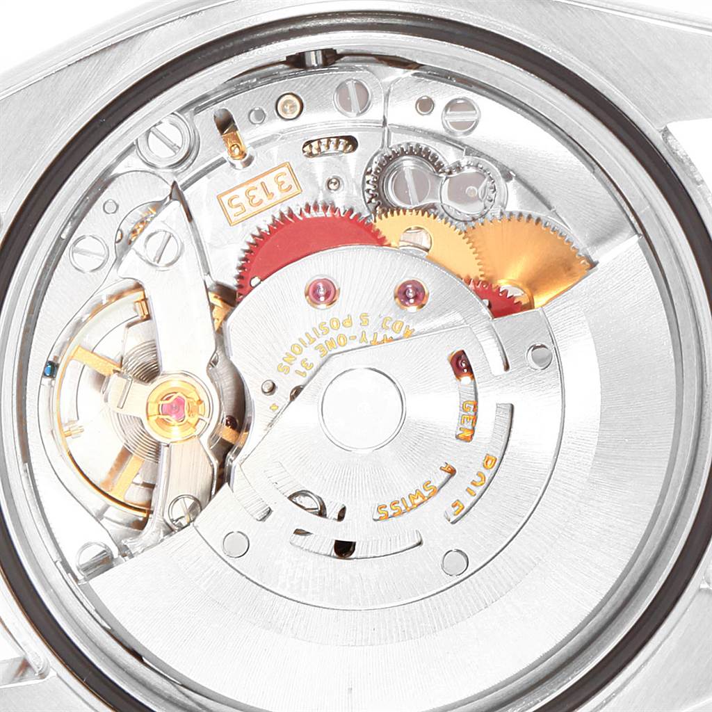 This image shows the internal movement mechanism of a Rolex Datejust 116244 Men's Stainless Steel Silver Dial 116244 Men's Stainless Steel Silver Dial model watch taken from a close-up angle.