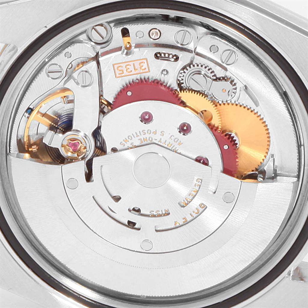 The image shows the internal movement parts of a Rolex Datejust 116233 Men's Stainless Steel Champagne Dial 116233 Men's Stainless Steel Champagne Dial watch viewed from the back.