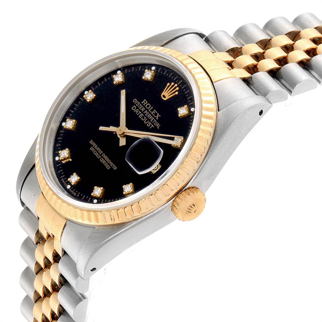 This Rolex Datejust 16233 Men's Steel and Gold (two tone) Black Dial 16233 Men's Steel and Gold (two tone) Black Dial watch is shown at a slight angle, displaying its dial, fluted bezel, and part of the bracelet.