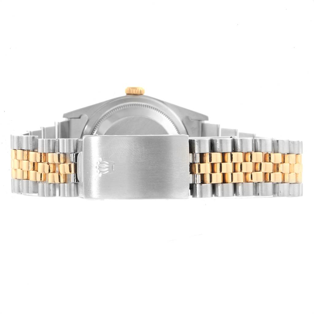 The image shows the back clasp and bracelet of the Rolex Datejust 16233 Men's Steel and Gold (two tone) Black Dial 16233 Men's Steel and Gold (two tone) Black Dial watch in a mix of gold and silver tones.