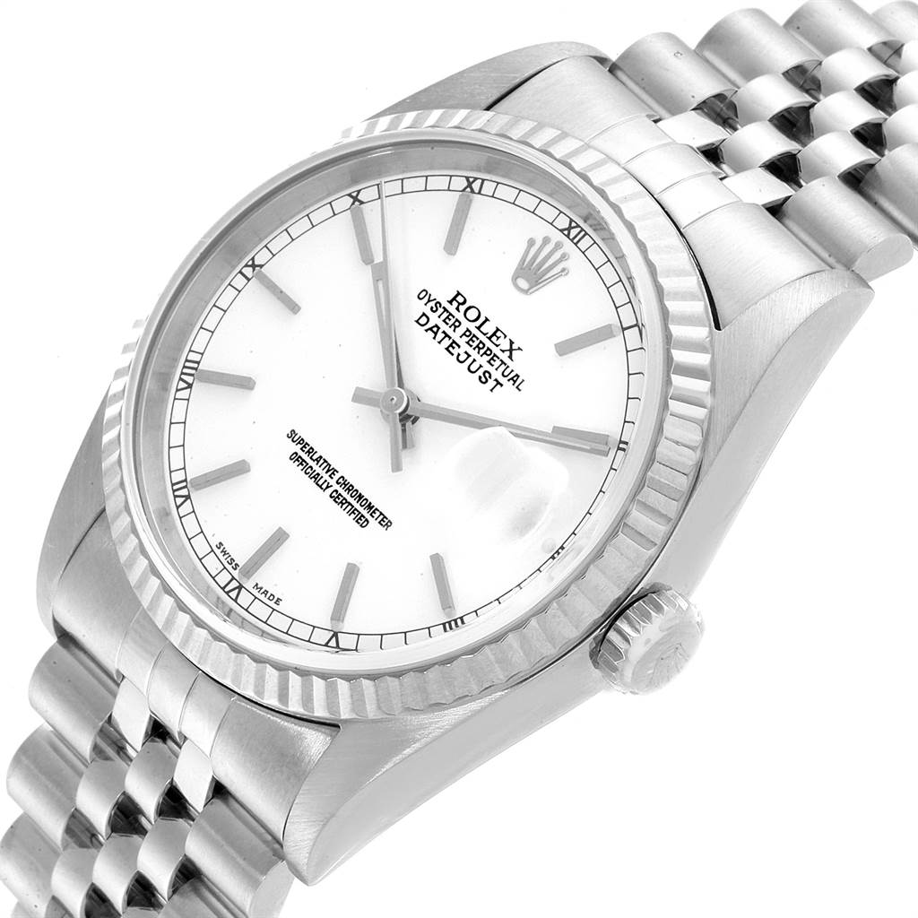 The image shows a close-up angle of the Rolex Datejust 16234 Men's Stainless Steel White Dial 16234 Men's Stainless Steel White Dial watch’s face, bezel, crown, and part of the bracelet.