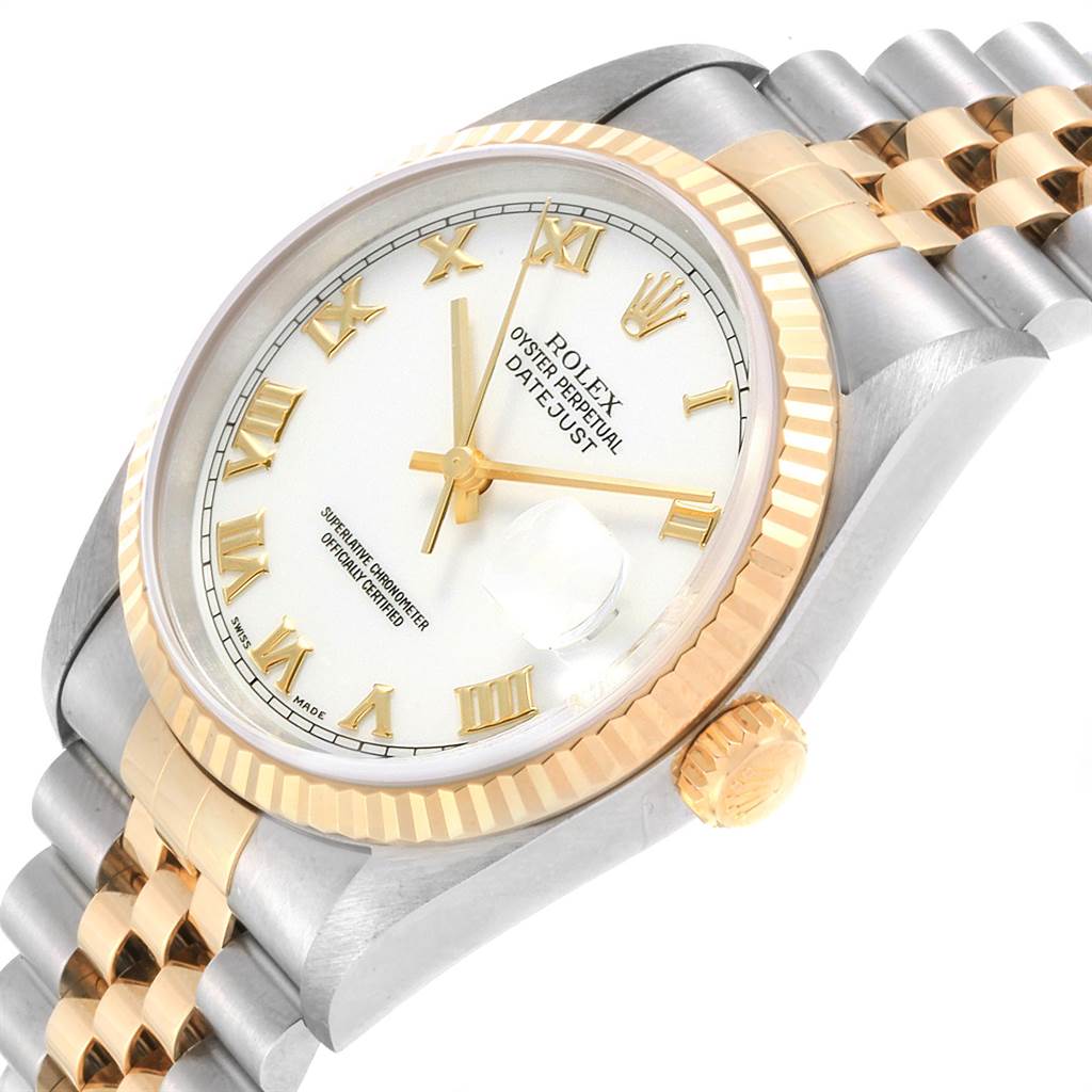 This image shows a Rolex Datejust 16233 Men's Steel and Gold (two tone) White Dial 16233 Men's Steel and Gold (two tone) White Dial watch at an angled view highlighting the face, bezel, and part of the band.