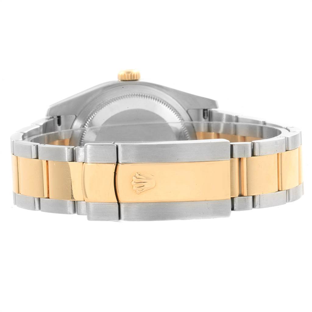 The image shows the clasp and bracelet of a Rolex Datejust 116243 Men's Stainless Steel Silver Dial 116243 Men's Stainless Steel Silver Dial watch with a gold and silver combination.