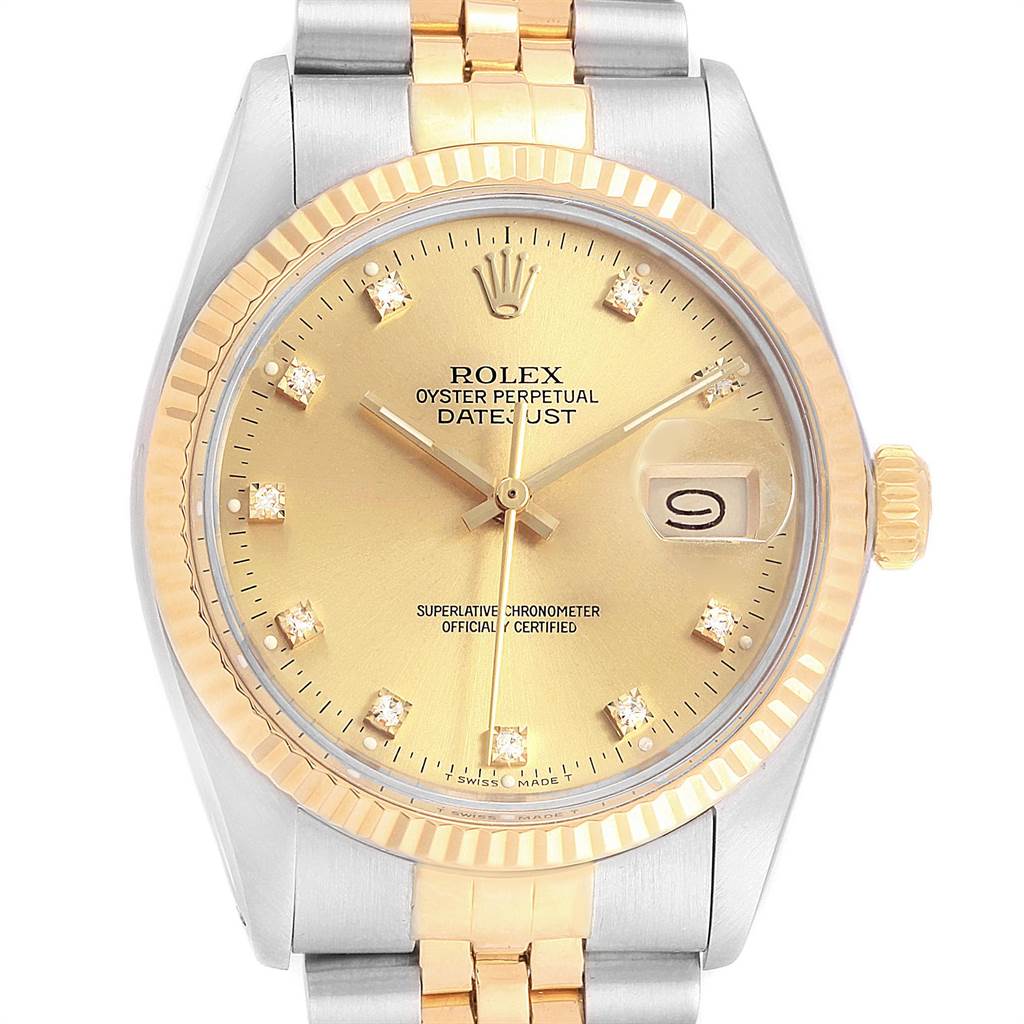 This image shows a front view of a Rolex Datejust 16013 Men's Stainless Steel Champagne Dial 16013 Men's Stainless Steel Champagne Dial watch, highlighting the dial, bezel, hands, and part of the bracelet.
