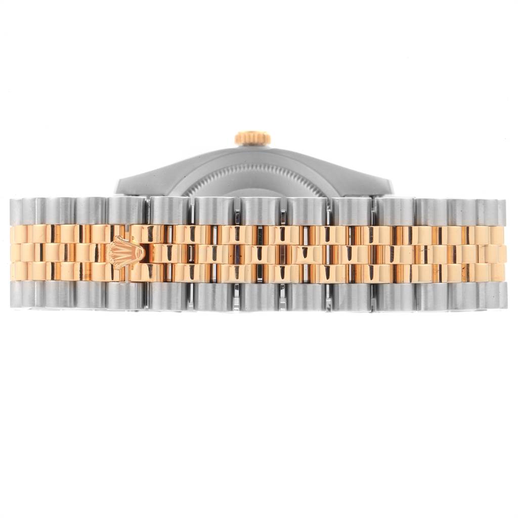 The image shows a straight-on view of the Rolex Datejust 116243 Men's Stainless Steel Silver Dial 116243 Men's Stainless Steel Silver Dial watch's two-tone bracelet and part of the crown.