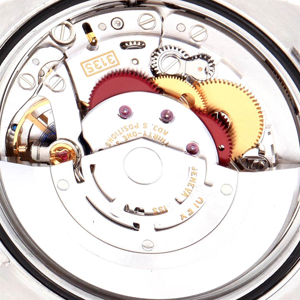 This image shows a close-up view of the movement and internal mechanism of a Rolex Datejust 116243 Men's Stainless Steel Silver Dial 116243 Men's Stainless Steel Silver Dial watch.