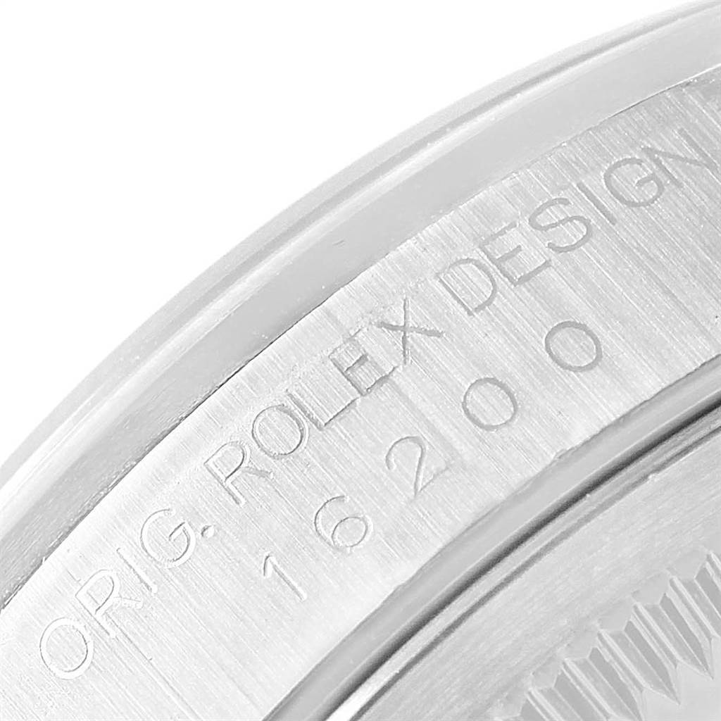 The image displays a close-up of the case back of a Rolex Datejust 16200 Men's Stainless Steel Blue Dial 16200 Men's Stainless Steel Blue Dial, showcasing the engraved model number "16200."