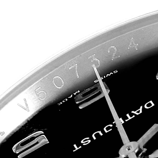 The close-up image shows the dial and part of the bezel of the Rolex Datejust 116234 Men's Stainless Steel Black Dial 116234 Men's Stainless Steel Black Dial model, highlighting the serial number.