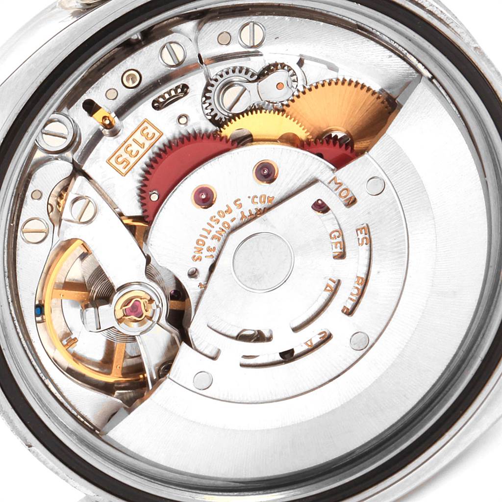 The image shows the intricate movement and internal mechanism of a Rolex Datejust 116234 Men's Stainless Steel Black Dial 116234 Men's Stainless Steel Black Dial watch, viewed from the back.