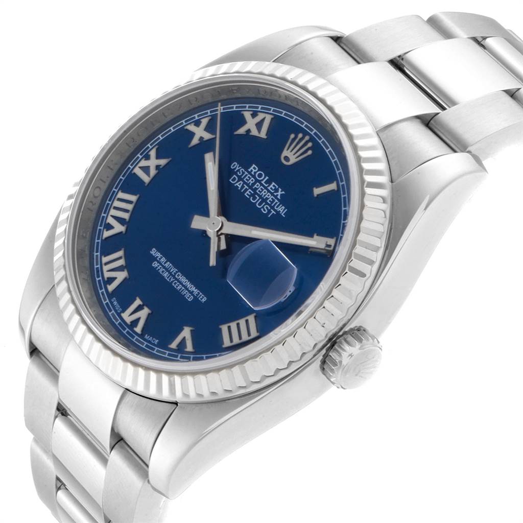 The Rolex Datejust 116234 Men
s Stainless Steel Blue Dial 116234 Men
s Stainless Steel Blue Dial watch is shown at an angle, highlighting the blue dial, Roman numerals, fluted bezel, and part of the bracelet.