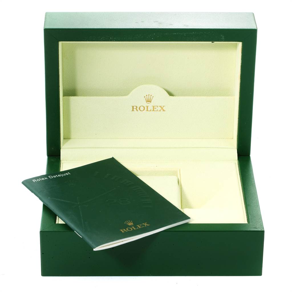 The image shows an open Rolex Datejust 116234 Men
s Stainless Steel Blue Dial 116234 Men
s Stainless Steel Blue Dial watch box with its instruction booklet located outside the box.