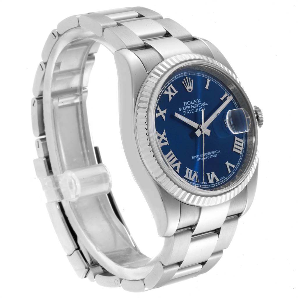 The image shows a Rolex Datejust 116234 Men
s Stainless Steel Blue Dial 116234 Men
s Stainless Steel Blue Dial watch at a three-quarter angle, highlighting its blue dial, Roman numerals, fluted bezel, and oyster bracelet.