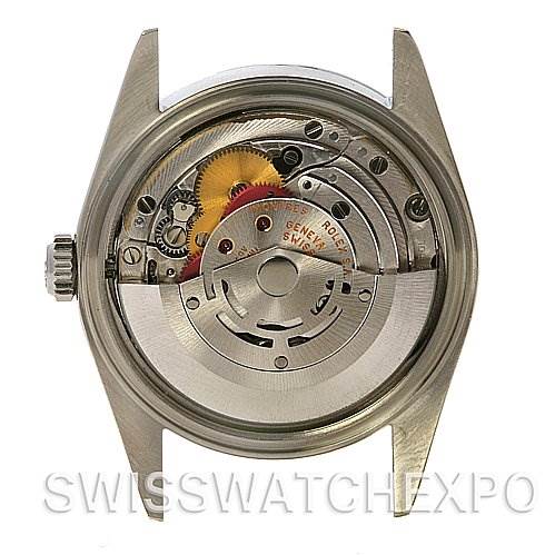 This image shows the backside view of a Rolex Datejust 16200 Men's Stainless Steel Black Dial 16200 Men's Stainless Steel Black Dial watch, revealing its intricate internal movement and rotor.