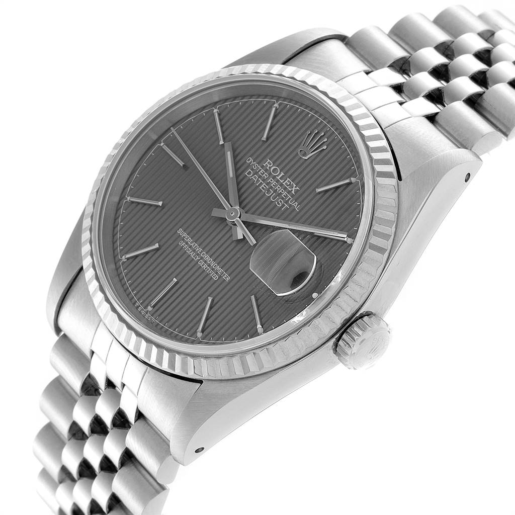 The image shows a close-up of a Rolex Datejust 16234 Men's Stainless Steel Grey Dial 16234 Men's Stainless Steel Grey Dial watch, featuring the face, bezel, and bracelet at an angled side view.