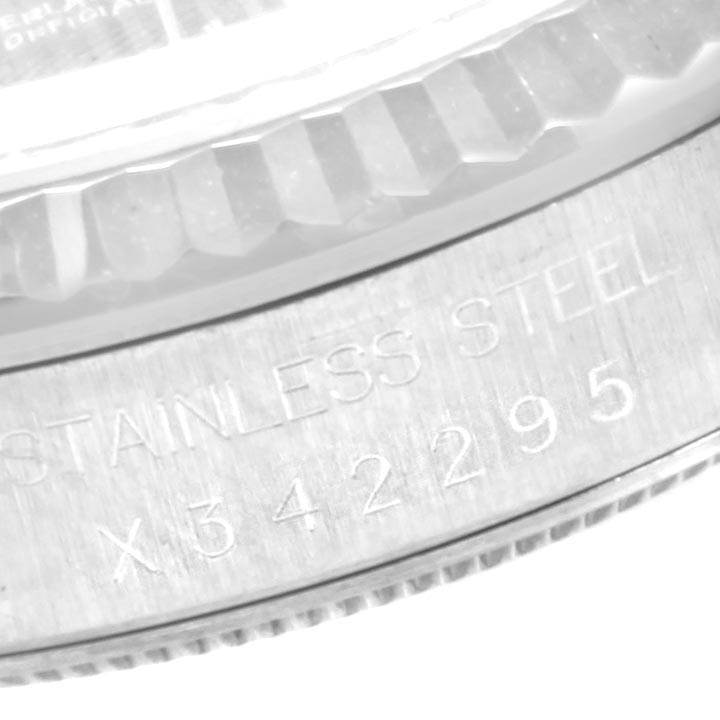 The image shows a close-up angle of the engravings on the stainless steel case back of a Rolex Datejust 16234 Men's Stainless Steel Grey Dial 16234 Men's Stainless Steel Grey Dial watch.