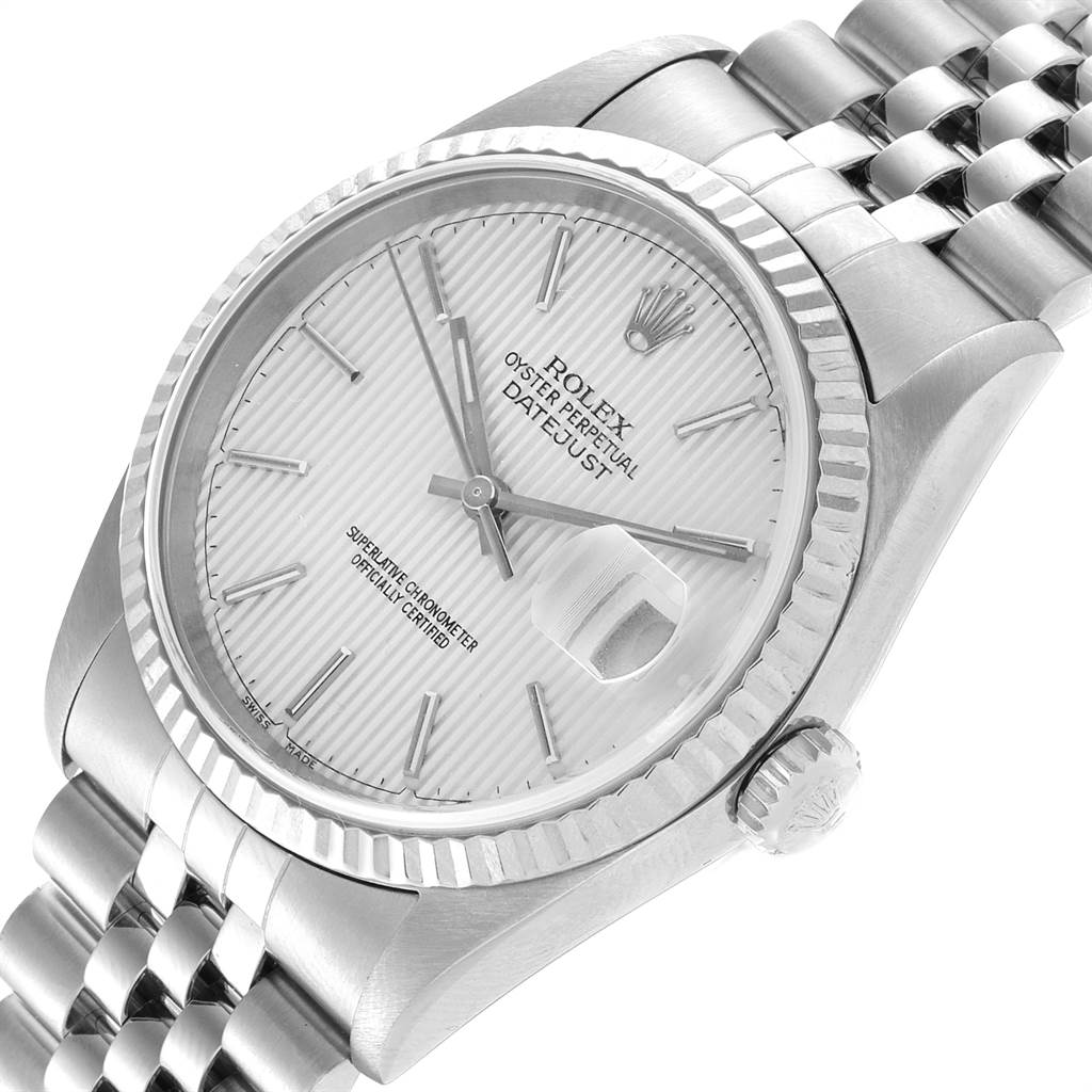 This image shows a close-up, angled view of the face and part of the bracelet of a Rolex Datejust 16234 Men's Stainless Steel Silver Dial 16234 Men's Stainless Steel Silver Dial watch.