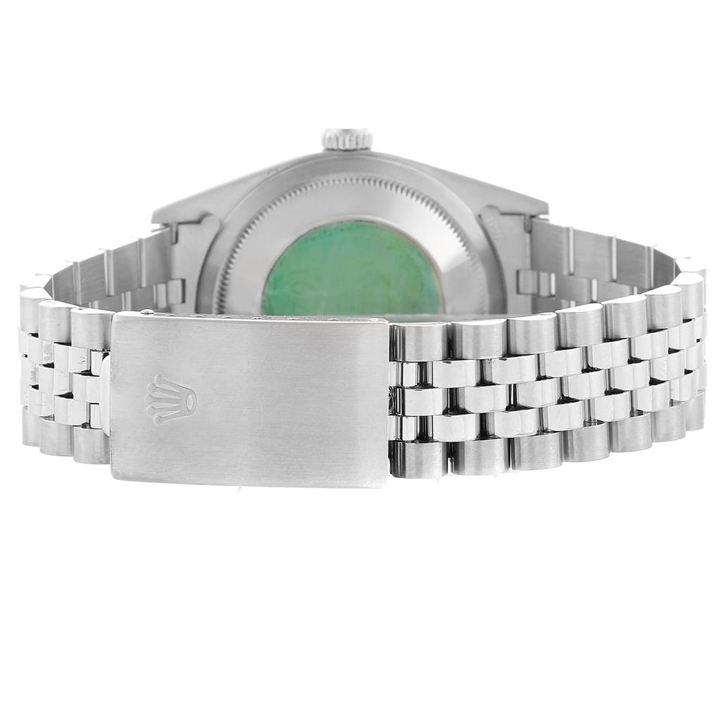 The image shows the back side of a Rolex Datejust 16234 Men's Stainless Steel White Dial 16234 Men's Stainless Steel White Dial watch, focusing on the caseback and bracelet clasp.