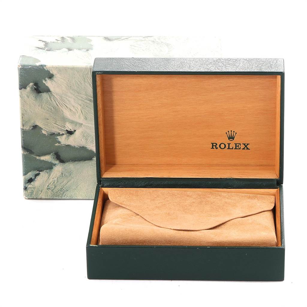 This image shows an open Rolex Datejust 16234 Men's Stainless Steel White Dial 16234 Men's Stainless Steel White Dial watch box with a tan cushion, along with its outer packaging.