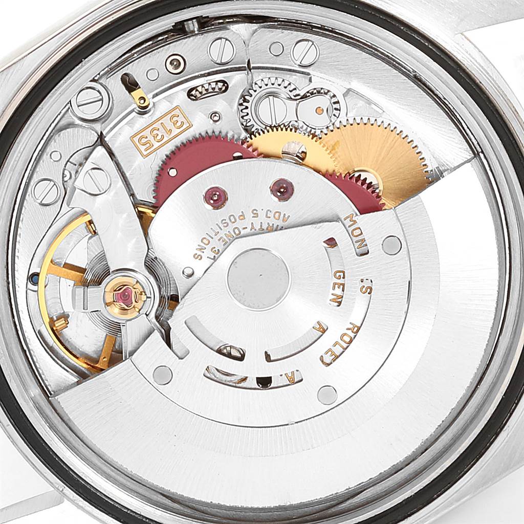 This image shows the intricate internal movement and mechanism of a Rolex Datejust 16233 Men's Steel and Gold (two tone) Silver Dial 16233 Men's Steel and Gold (two tone) Silver Dial watch.