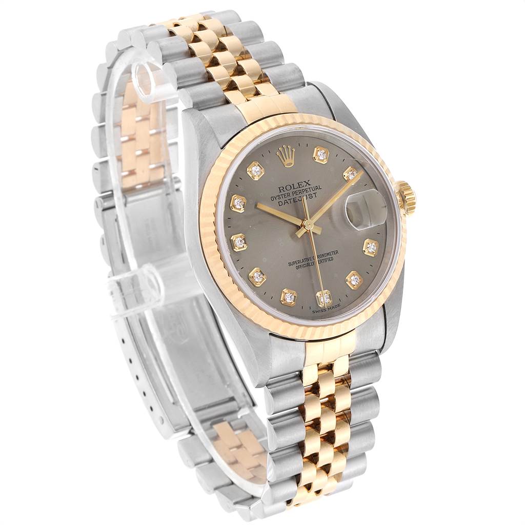 The image shows a Rolex Datejust 16233 Men's Steel and Gold (two tone) Silver Dial 16233 Men's Steel and Gold (two tone) Silver Dial model watch from a front-left angle, highlighting its gray dial and jubilee bracelet.