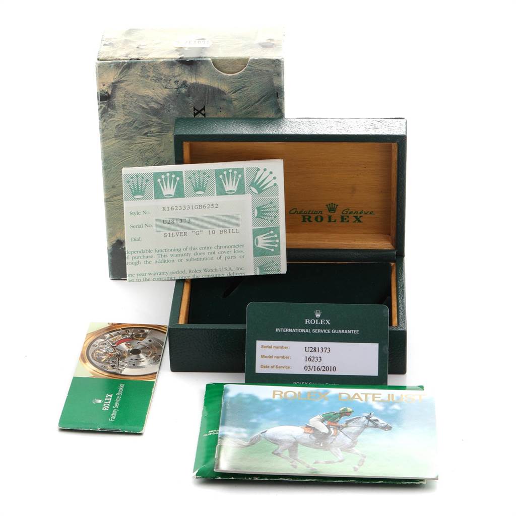 The image shows the packaging, papers, warranty, and box for a Rolex Datejust 16233 Men's Steel and Gold (two tone) Silver Dial 16233 Men's Steel and Gold (two tone) Silver Dial watch.