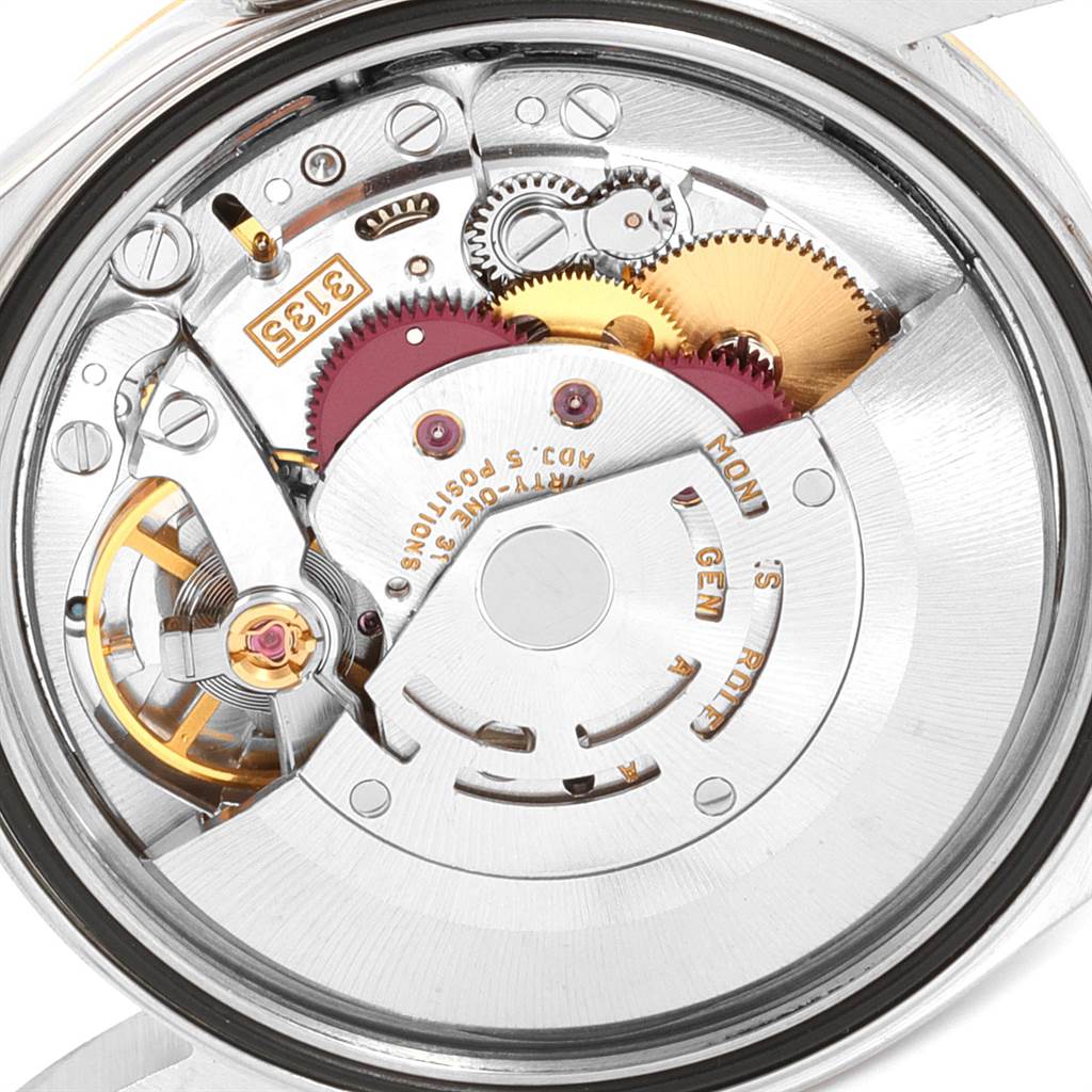 This image shows the movement and mechanical parts of a Rolex Datejust 16233 Men's Steel and Gold (two tone) Silver Dial 16233 Men's Steel and Gold (two tone) Silver Dial watch from a rear, open-case-back angle.