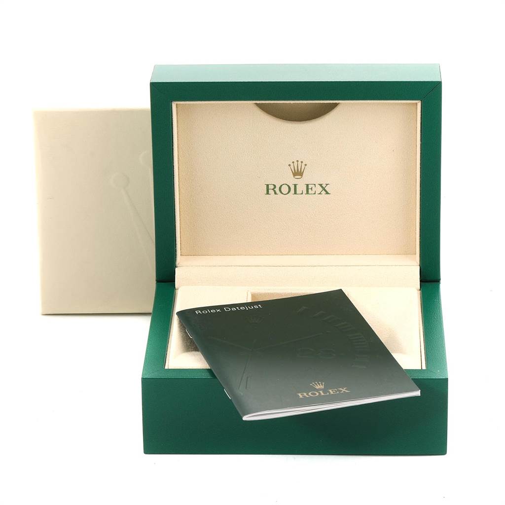 The image shows a Rolex Datejust 116243 Men
s Steel and Gold (two tone) Champagne Dial 116243 Men
s Steel and Gold (two tone) Champagne Dial watch box open, with a booklet placed inside the box.