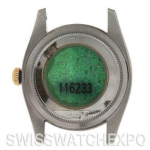 This image shows the back case of a Rolex Datejust 116233-SRJ Men
s Stainless Steel Silver Dial 116233-SRJ Men
s Stainless Steel Silver Dial model watch, with the serial number and trademark hologram visible.