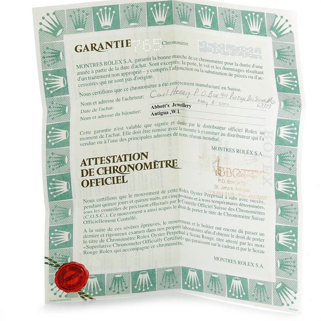 This image shows a Rolex Datejust 16233 Men's Steel and Gold (two tone) Grey Dial 16233 Men's Steel and Gold (two tone) Grey Dial warranty certificate with text in both French and English, including official seals and stamps.