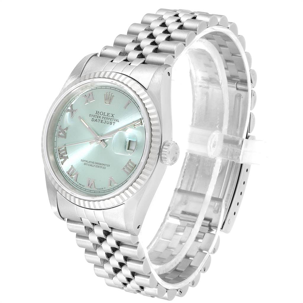 The image shows a Rolex Datejust 16234 Men's Stainless Steel Blue Dial 16234 Men's Stainless Steel Blue Dial watch at a slight side angle, highlighting the dial, fluted bezel, and the Jubilee bracelet.