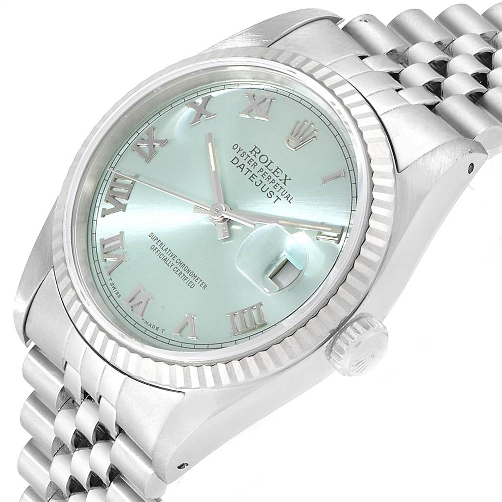 The Rolex Datejust 16234 Men's Stainless Steel Blue Dial 16234 Men's Stainless Steel Blue Dial watch is shown at a slight angle, displaying its face, crown, and bracelet.