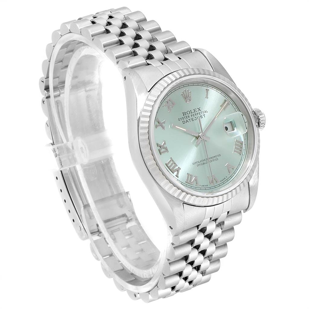 The image shows a side and front angle of a Rolex Datejust 16234 Men's Stainless Steel Blue Dial 16234 Men's Stainless Steel Blue Dial watch, displaying its dial, bezel, and stainless steel jubilee bracelet.