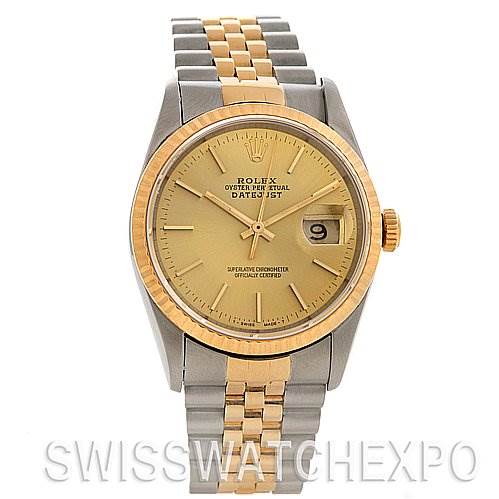 This image shows a frontal view of a Rolex Datejust 16233 Men's Stainless Steel Champagne Dial 16233 Men's Stainless Steel Champagne Dial watch with a gold and silver bracelet.