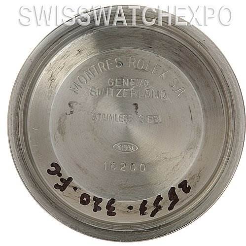 The image shows the inner case back of a Rolex Datejust 16233 Men's Stainless Steel Champagne Dial 16233 Men's Stainless Steel Champagne Dial model, with inscriptions and model number visible.