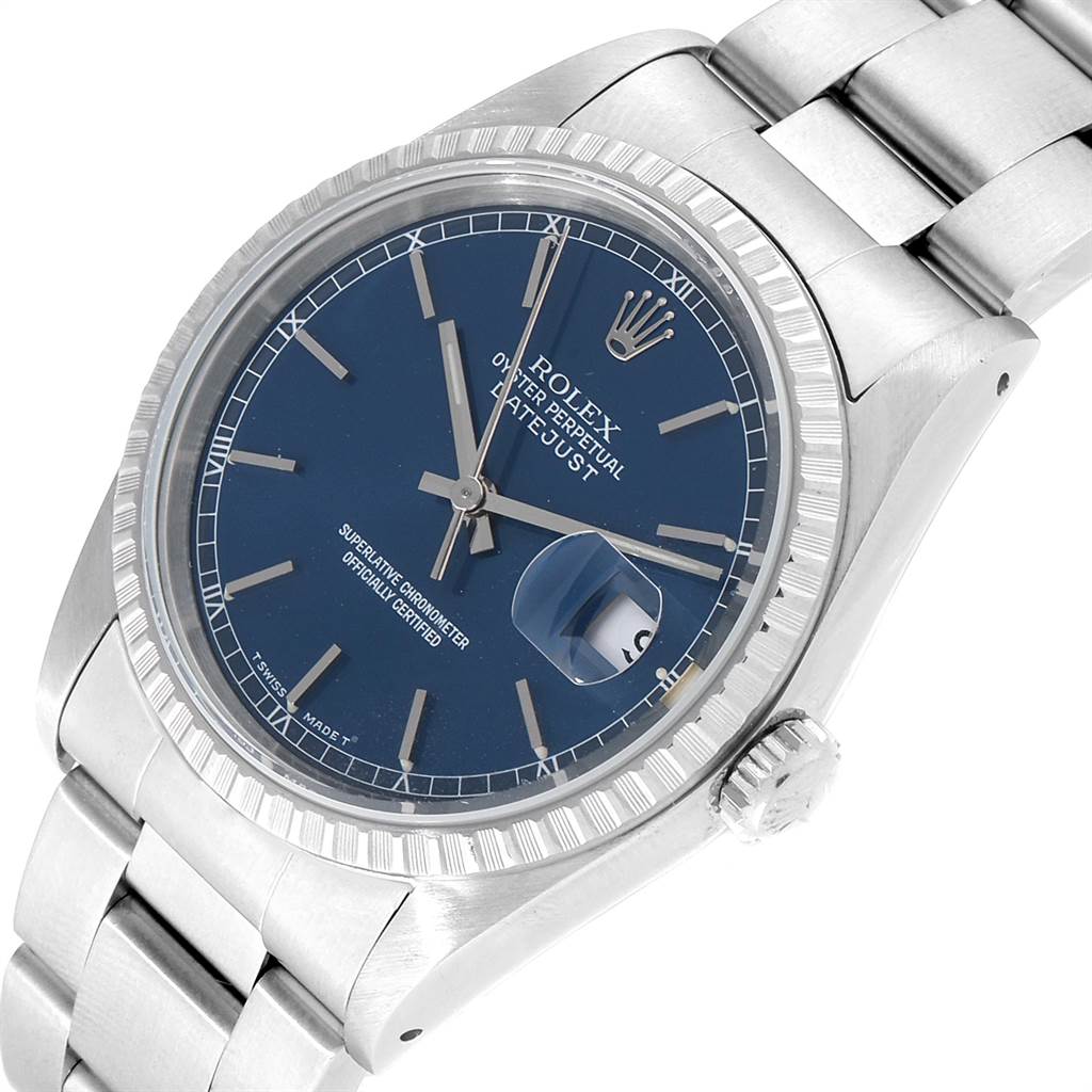 The image shows a Rolex Datejust 16220 Men's Stainless Steel Blue Dial 16220 Men's Stainless Steel Blue Dial watch from a three-quarter angle, highlighting its blue dial, fluted bezel, and metal bracelet.