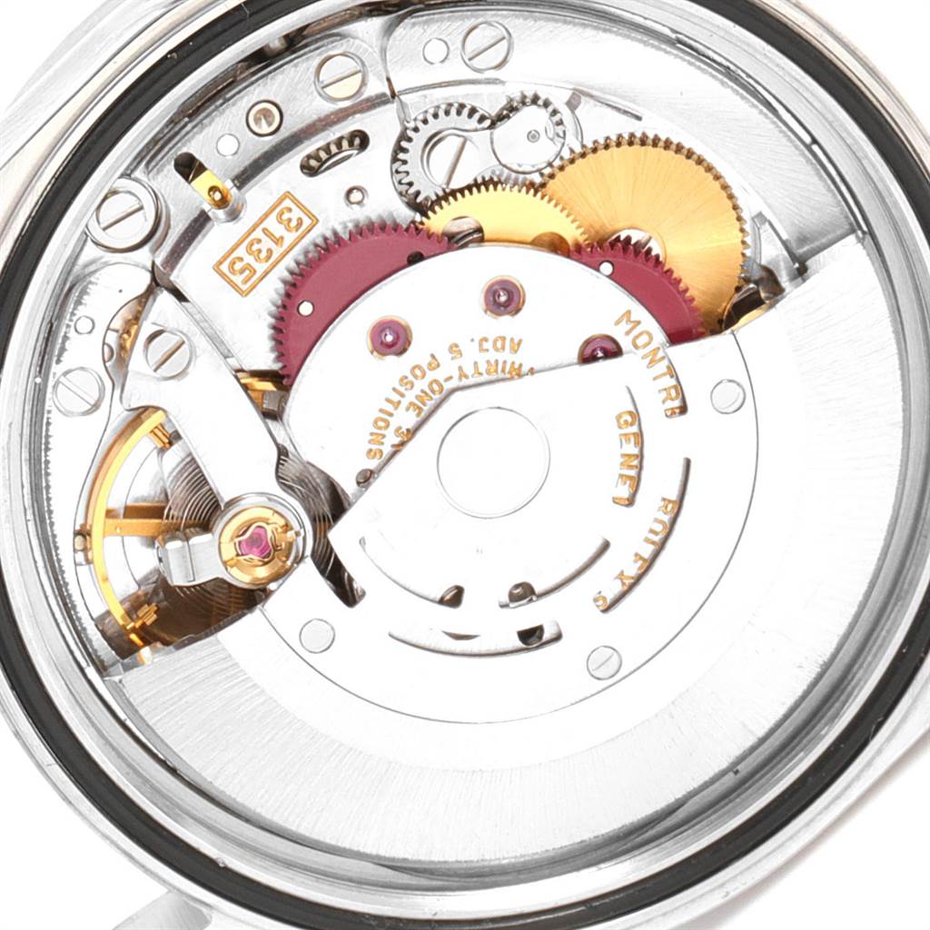 This image shows the internal movement mechanism of a Rolex Datejust 16220 Men's Stainless Steel White Dial 16220 Men's Stainless Steel White Dial watch, highlighting gears and components.