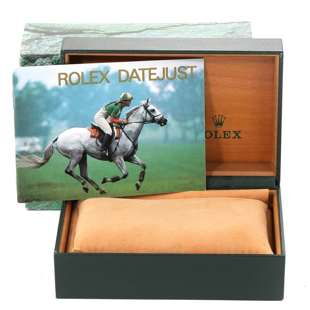 The image shows the box and manual for a Rolex Datejust 16234 Men
s Stainless Steel Pink Dial 16234 Men
s Stainless Steel Pink Dial watch.