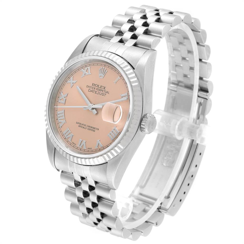 The image shows a Rolex Datejust 16234 Men
s Stainless Steel Pink Dial 16234 Men
s Stainless Steel Pink Dial watch at an angled view, highlighting the face, bezel, crown, and Jubilee bracelet.