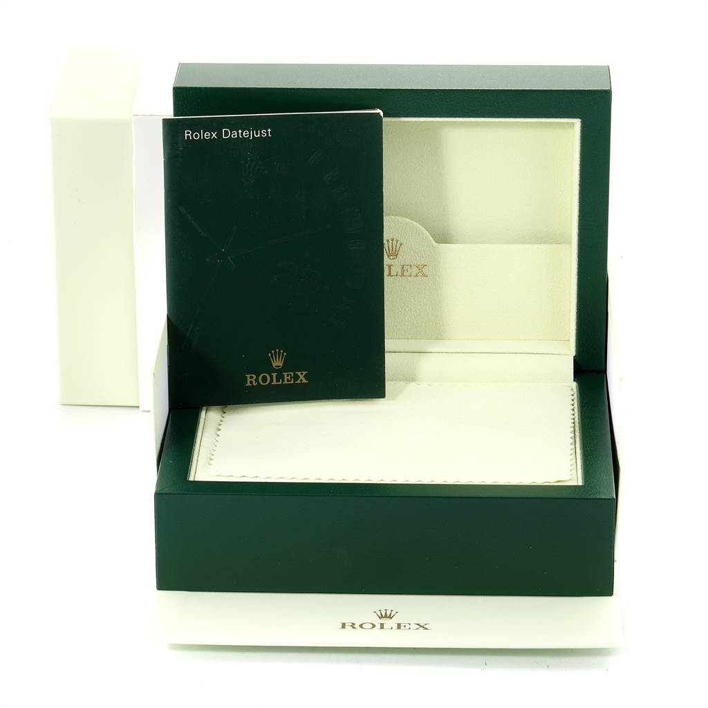 The image shows the packaging and booklet for a Rolex Datejust 116243 Men
s Steel and Gold (two tone) Champagne Dial 116243 Men
s Steel and Gold (two tone) Champagne Dial, displaying the box and warranty card holder.