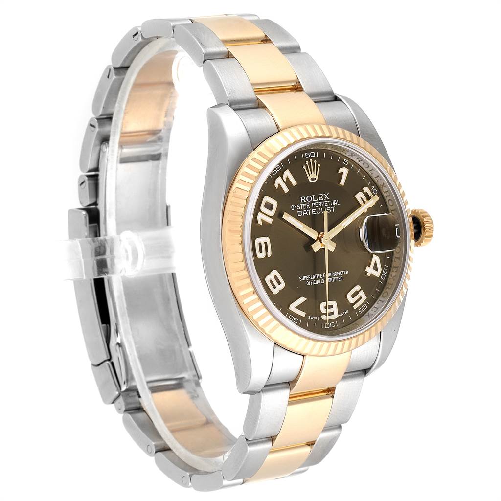 This image showcases a Rolex Datejust 116233 Men's Steel and Gold (two tone) Brown Dial 116233 Men's Steel and Gold (two tone) Brown Dial watch from a three-quarter angle, highlighting its dial, bezel, and part of its bracelet.
